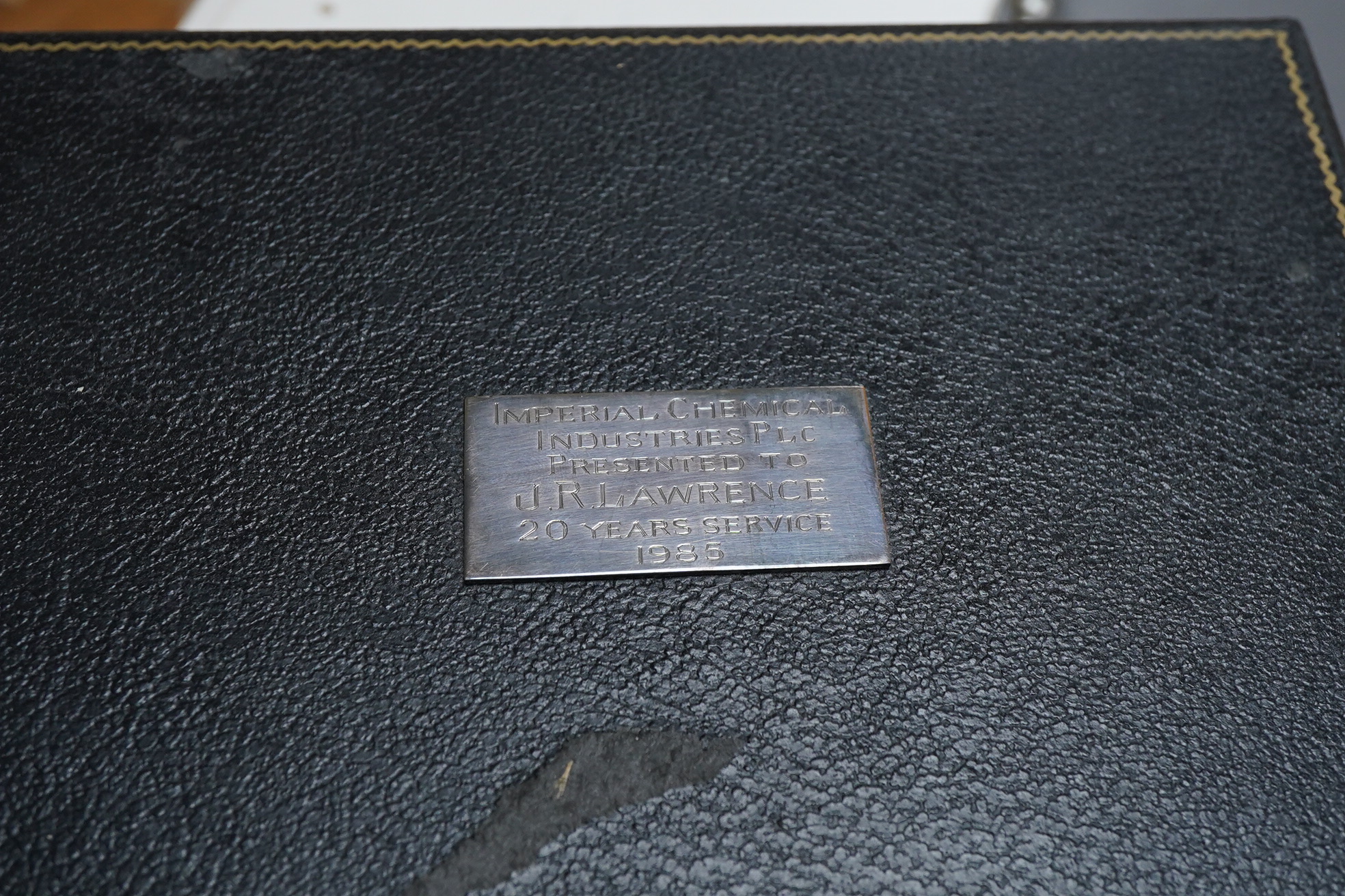 A cased pair of silver pedestal goblets, by Parkinson Silversmiths Ltd, Sheffield, 1984, height 10.6cm, 5.5oz, the case with engraved presentation plaque.